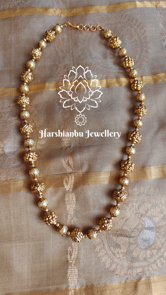 Amudhu pearl mala