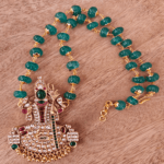 Kundan kamakshi pendant with precious pumpkin beads