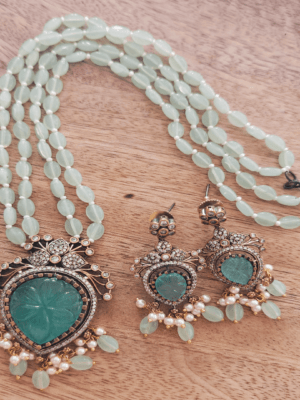 Tilak victorian pendant set with mint green beads