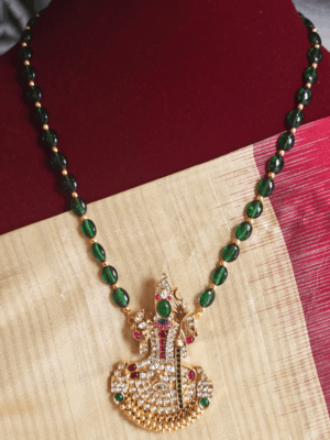 Kundan kamakshi with green beads