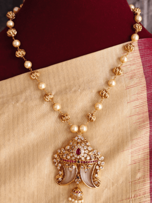 Royal tiger claw pendant with antique pearl mala