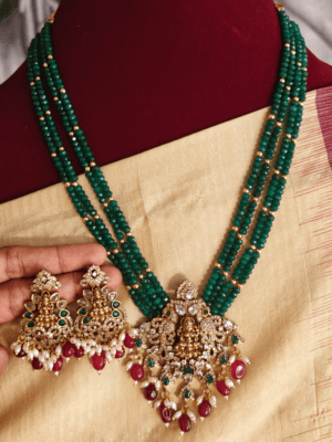 Lakshmi pendant set with four line dark green beads with antique gold balls