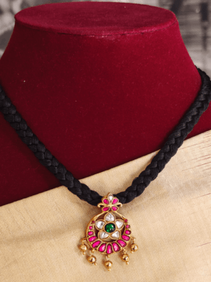 Nakshatra poo jadau pendant with braided black rope