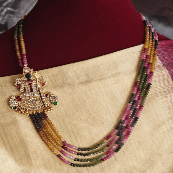 Kundan kamakshi in exclusive tourmaline beads