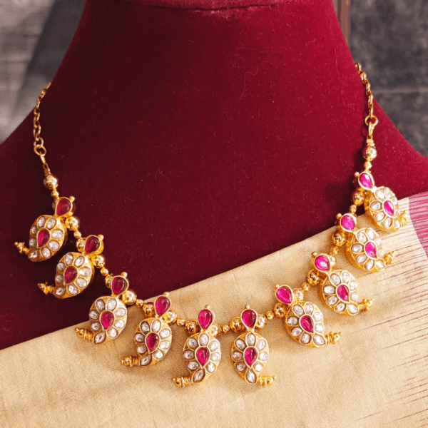 Maanga necklace in ruby and white kundan jadau