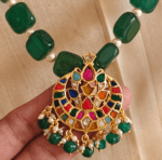 Navratna pendant with green flat beads mixed with pearls