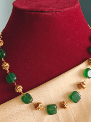 Green flat beads chain with antique balls