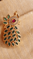 Emerald peacock feathers saree pin