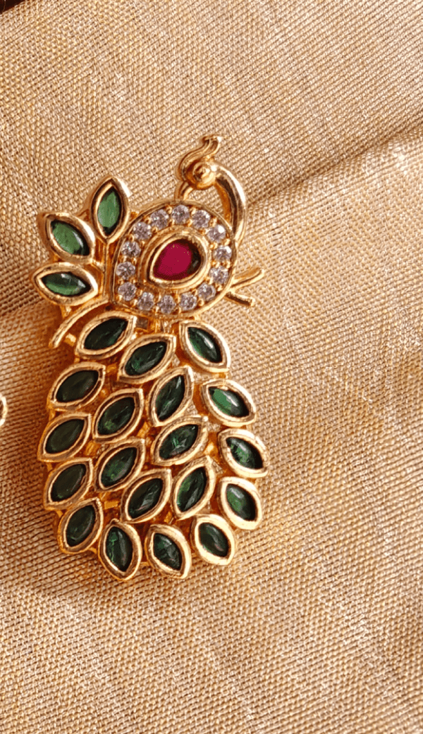 Emerald peacock feathers saree pin