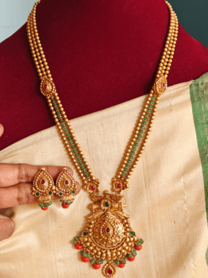 Padhakkam haaram with green beads gold balls chain