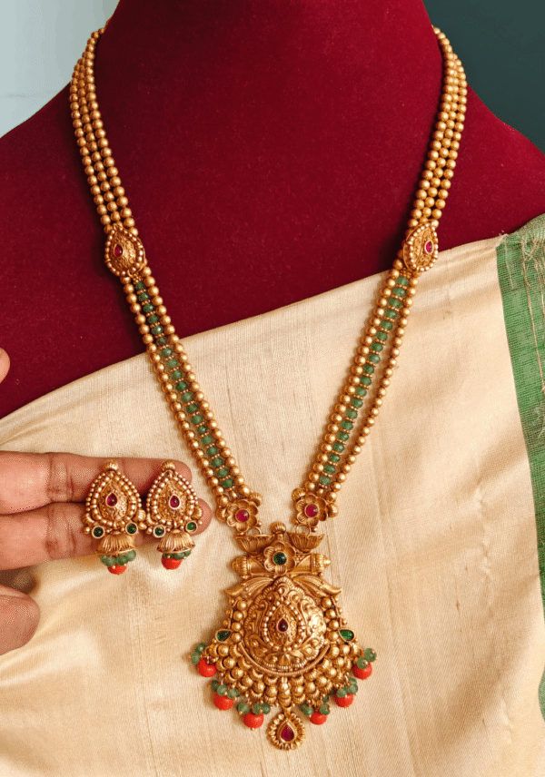 Padhakkam haaram with green beads gold balls chain