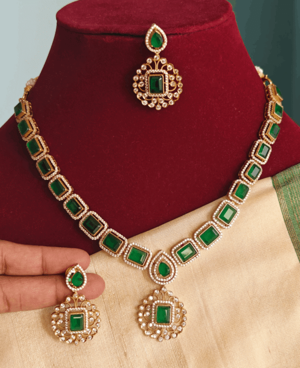 Emerald solitaire necklace