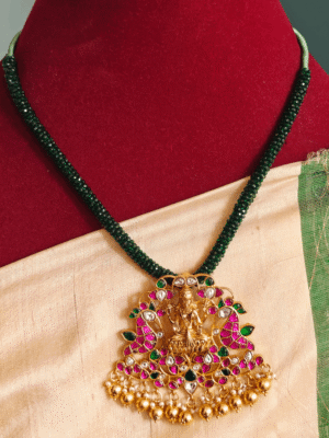Jadau lakshmi pendant with green hydrocrystal bead