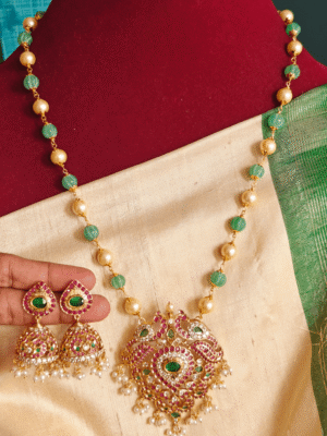 Double peacock pendant set with mint green pumpkin beads