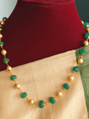 Green pumpkin beads with pearl mala