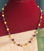 Violet pumpkin beads with pearl mala