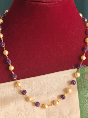 Violet pumpkin beads with pearl mala