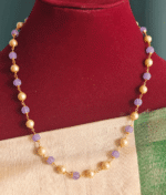 Purple pumpkin beads with pearl mala