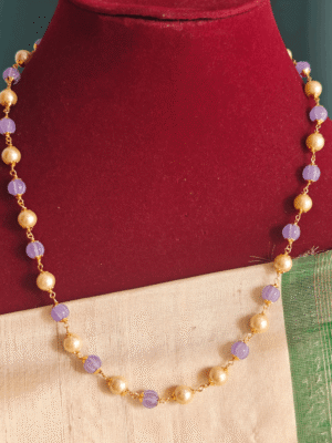 Purple pumpkin beads with pearl mala