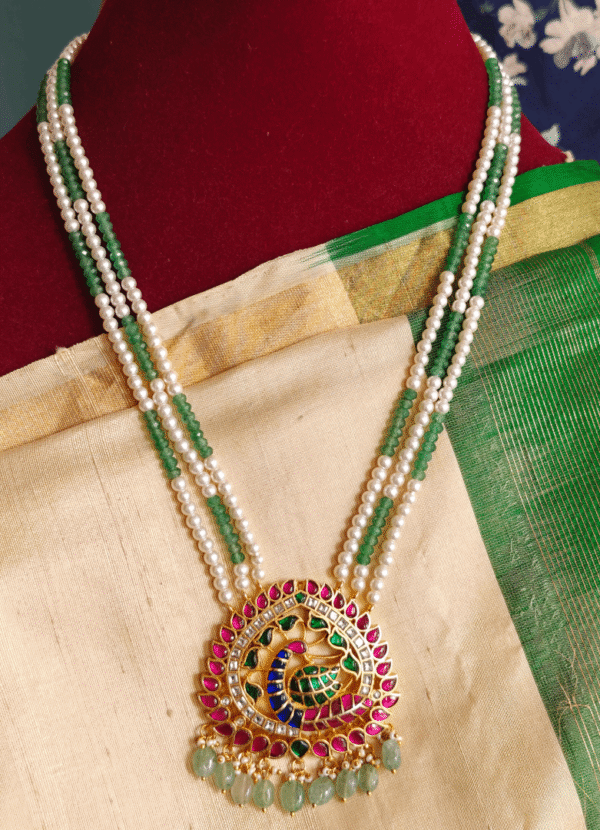 Peacock jadau pendant with three line pearl and green beads chain