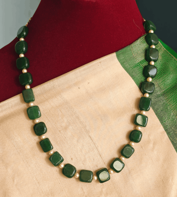 Flat beads with pearls mala