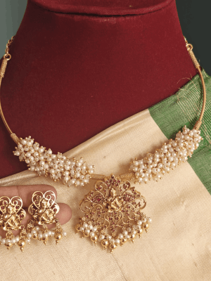 Ruby bal krishna hasli pendant set