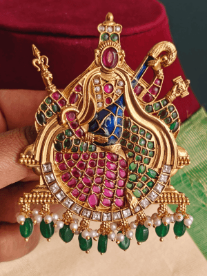 Saraswati with blue veena brooch