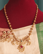 Guttapusalu pendant set with lotus chain