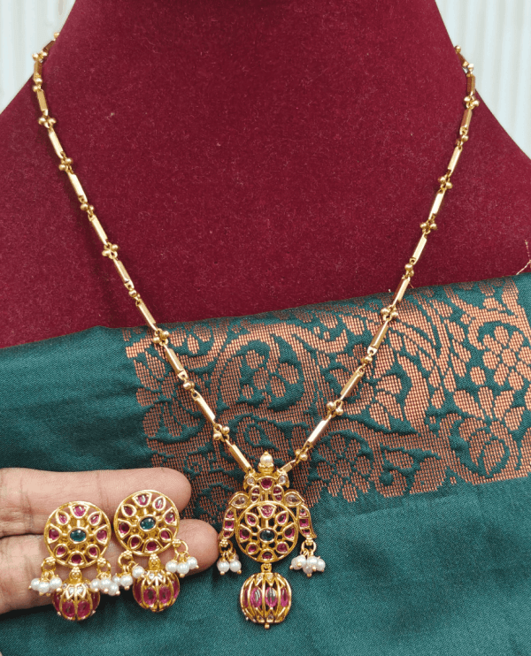 Double peacock flower pendant with salangai chain