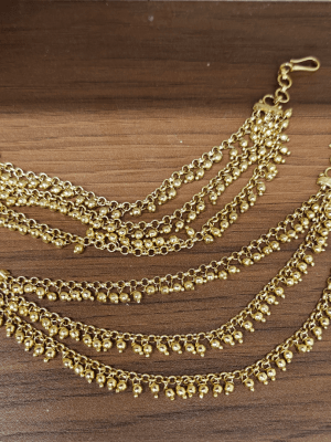 Gold ball ear chain