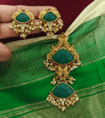 Double carved stone pendant