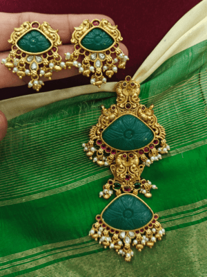 Double carved stone pendant