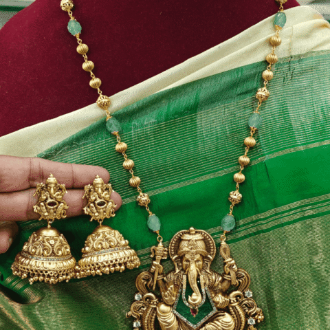 Ganesha grandeur emerald set with jhumkha