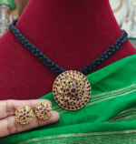 Flower pendant set with braided black rope