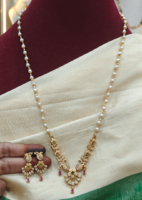 Peacock flower pendant with pearl chain