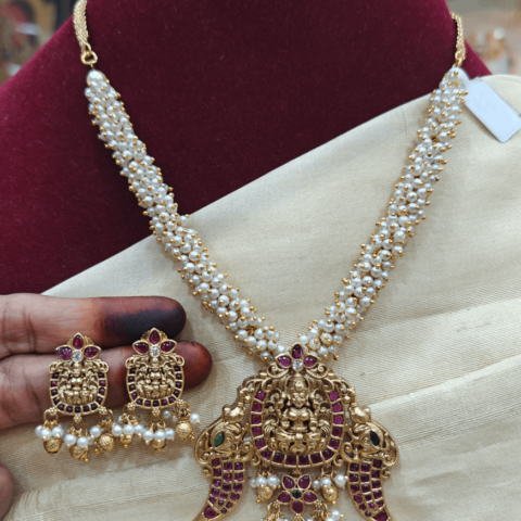 Lakshmi claw pendant with cluster pearls mala