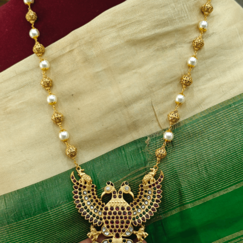 Red Gandaberunda pendant with pearl mala