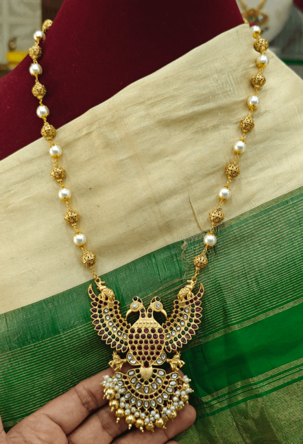 Red Gandaberunda pendant with pearl mala