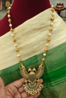 Green Gandaberunda pendant with pearl mala