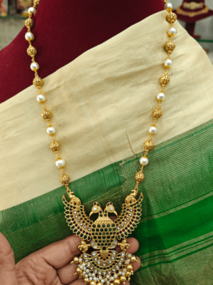 Green Gandaberunda pendant with pearl mala