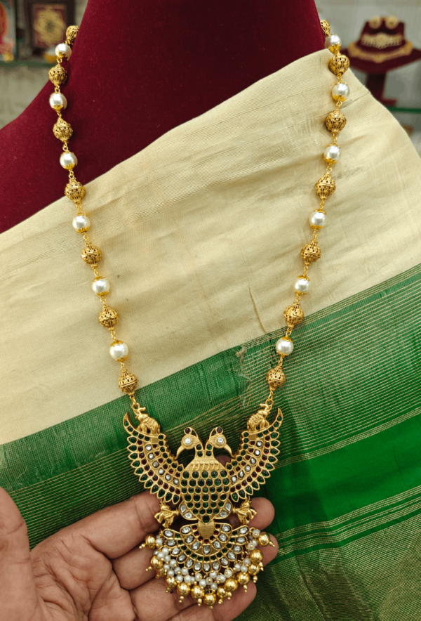 Green Gandaberunda pendant with pearl mala