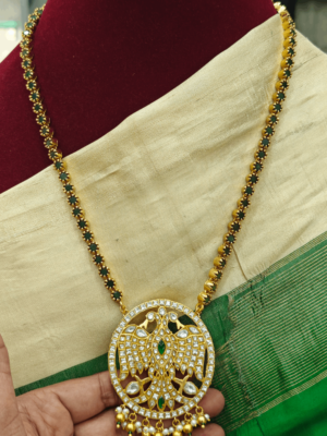 Jadau Gandaberunda pendant with green stone chain (White)