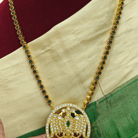 Jadau Gandaberunda pendant with green stone chain (White)