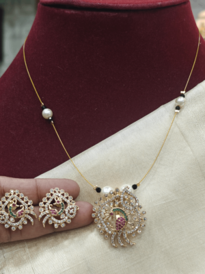 Amrutha peacock invisible set (Ruby green)