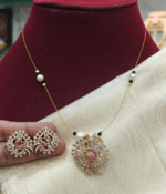 Amrutha peacock invisible set (Ruby white)