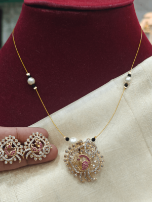 Amrutha peacock invisible set (Ruby white)