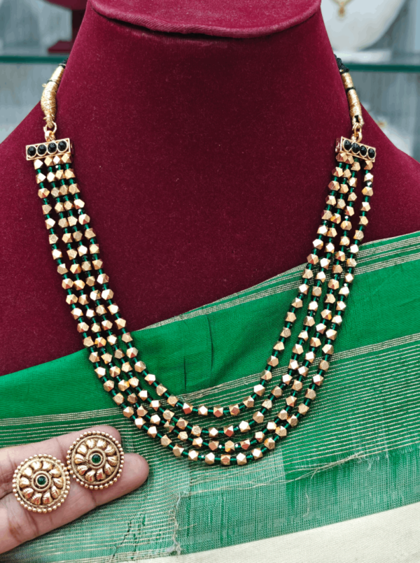 Four line thulasi beads antique short mala (green)