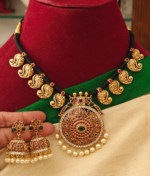 Double peacock pendant set with mango motifs black rope necklace