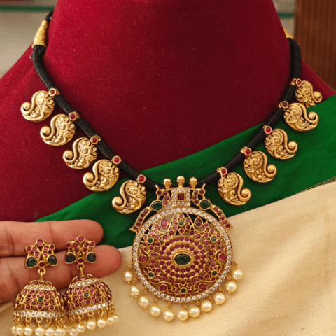 Double peacock pendant set with mango motifs black rope necklace