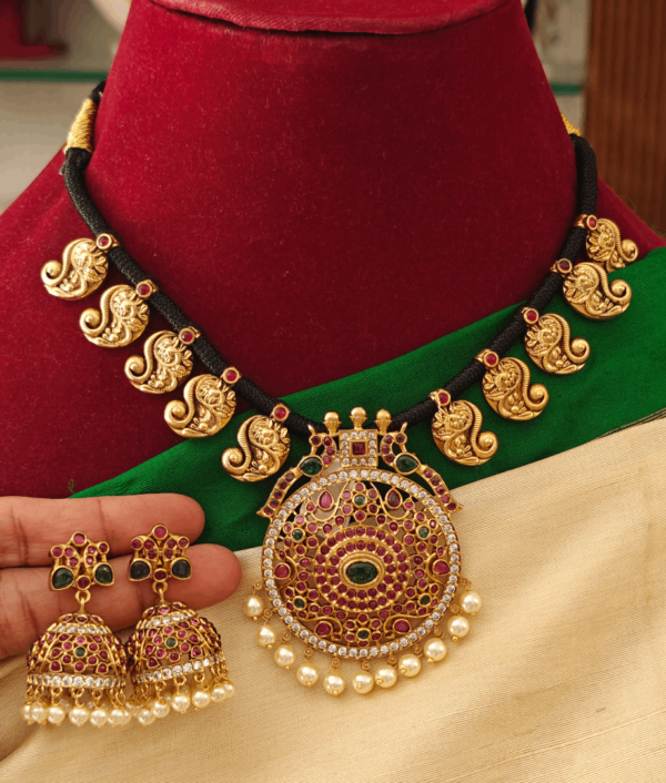 Double peacock pendant set with mango motifs black rope necklace